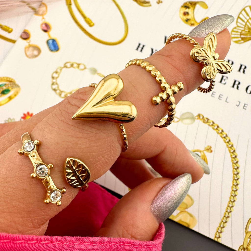 "CROSSES" RING, 18K GOLD PLATED STEEL